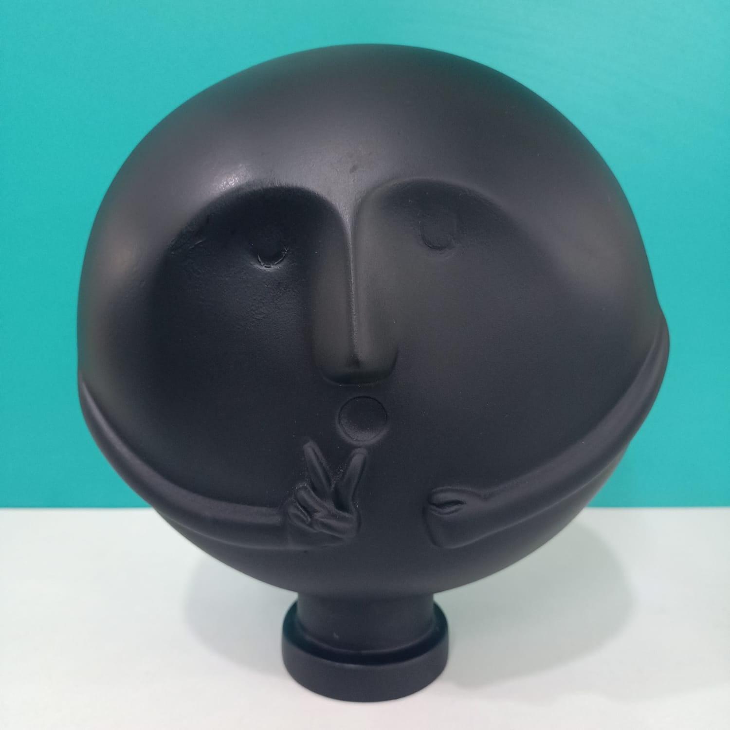 CLEVER CLAY MAN SCULPTURE